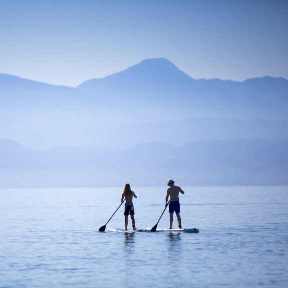 Paddle boarding at Buca Beach Club