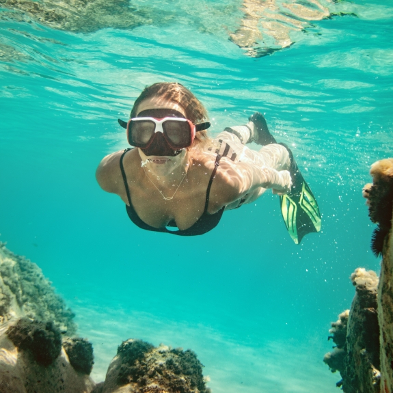 Snorkelling in the crystal clear waters at Neilson | Cook's Club Adakoy