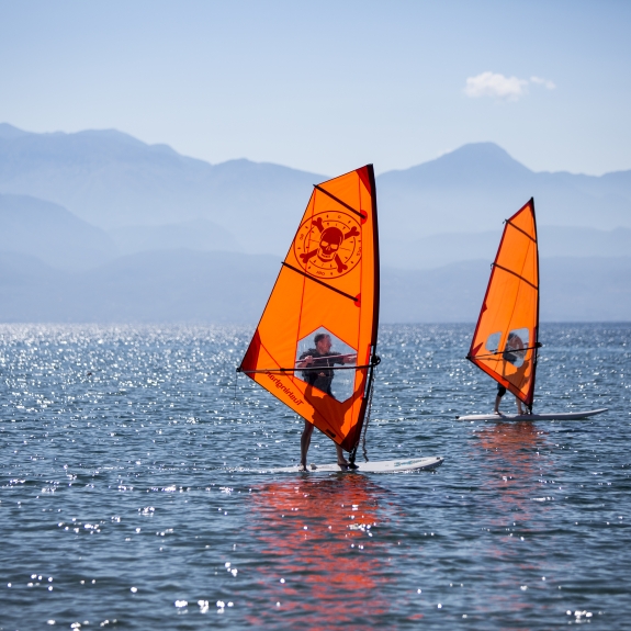 Beginner windsurfers at Buca Beach Club