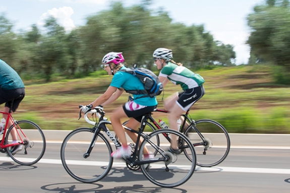 Group of people road biking