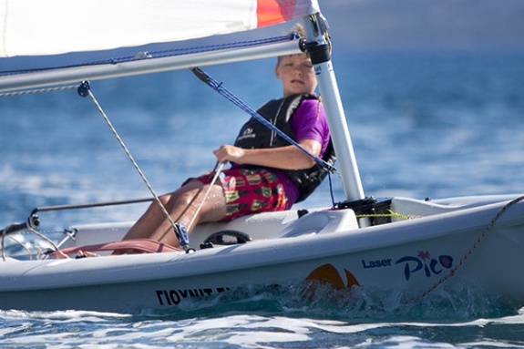 young boy dinghy sailing