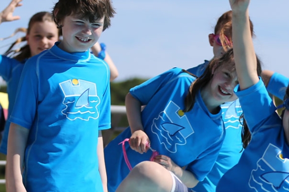 Group of children playing in swimming pool