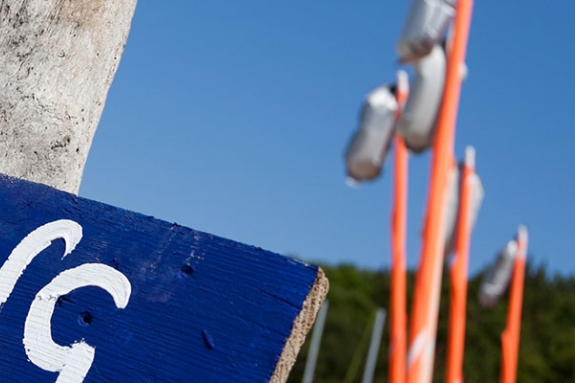 Beach and sailing signpost