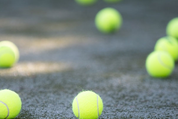 Tennis balls on a tennis court