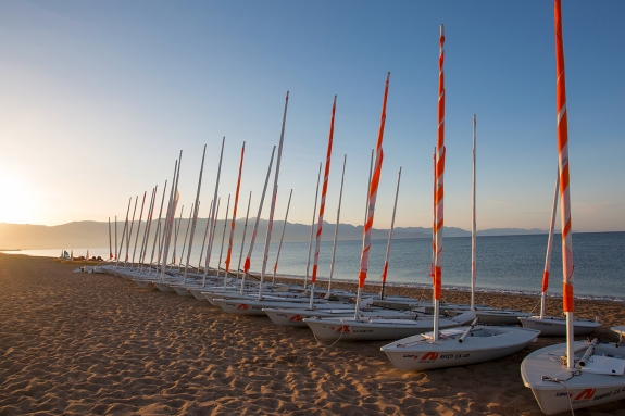 View of dinghies on Messini Beach at sunrise