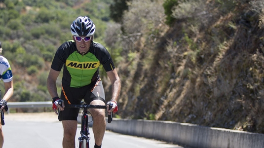 Man and woman road cycling