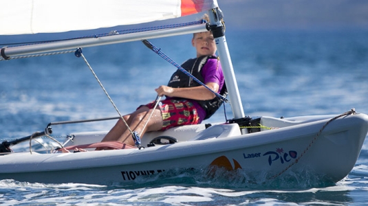 young boy dinghy sailing