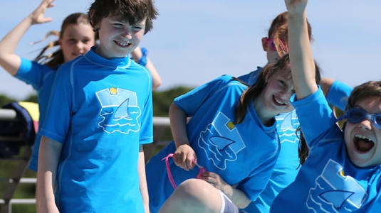 Group of children playing in swimming pool
