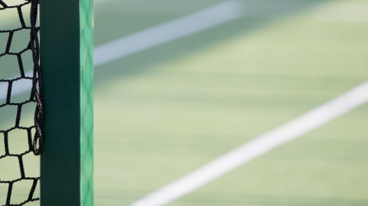 close up of tennis court and net