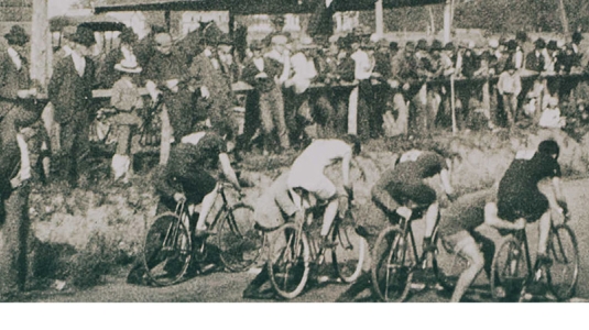 old black and white photograph of cyclists