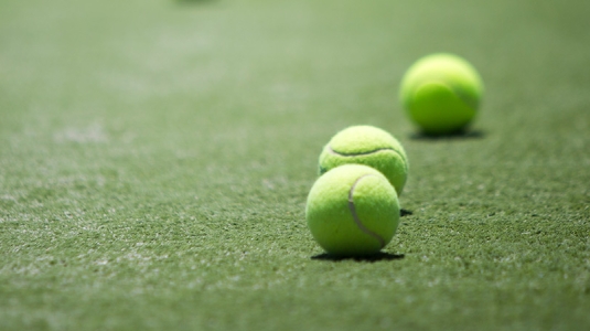 tennis balls on a tennis court