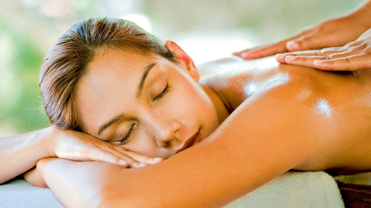 Woman having a back massage