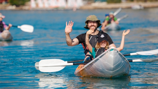 Father and daughter on a kayak