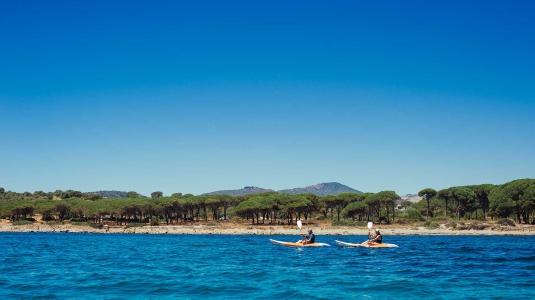 Two people kayaking in Sardinia