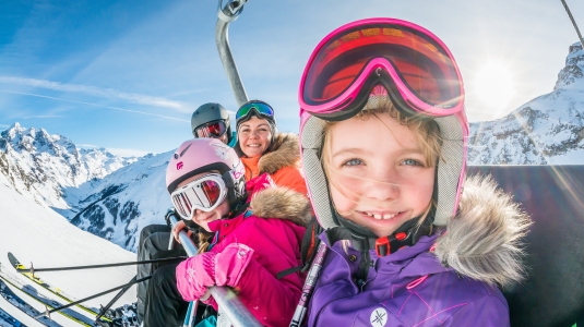 Family on ski lift