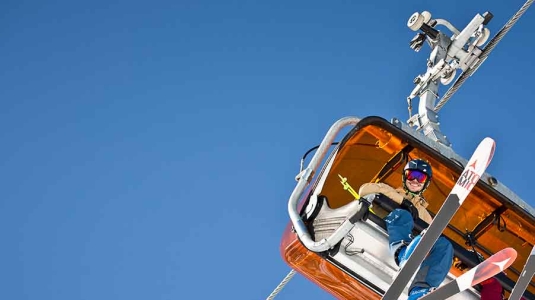 People on a ski chairlift