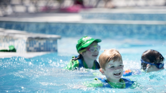 Children playing in a swimming pool