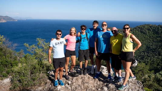 Group smiling with a view