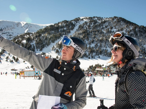 People talking on the slopes in Andorra