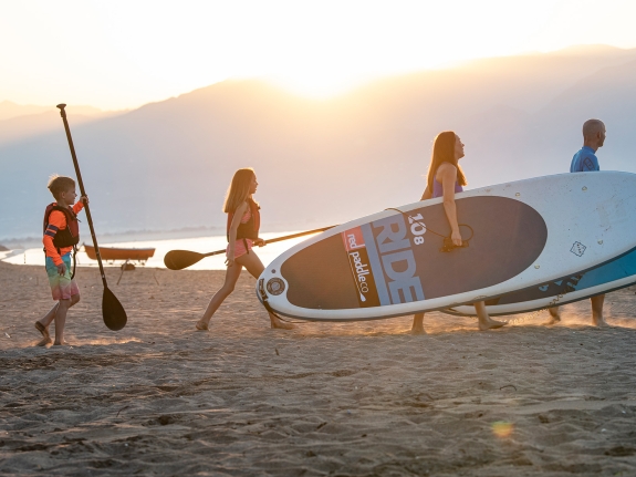 family paddle boarding