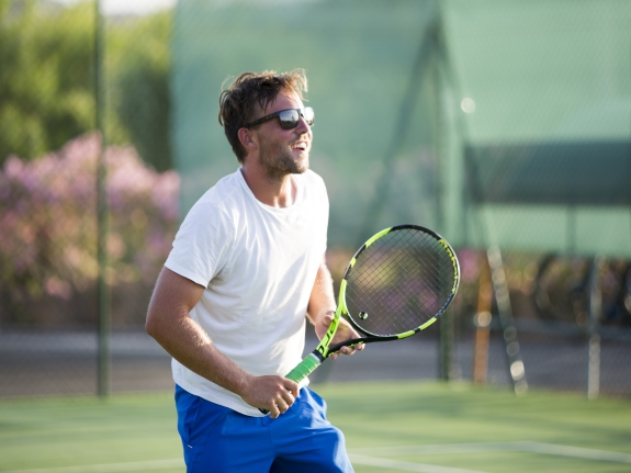 Man playing tennis