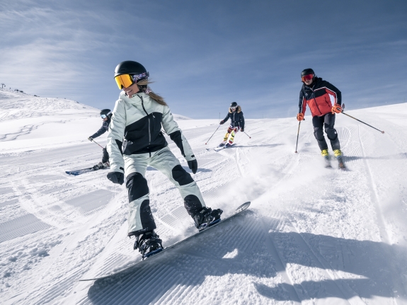 People skiing and snowboarding in France