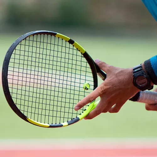 Man playing tennis