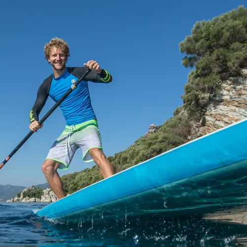 Man stand up paddle boarding 