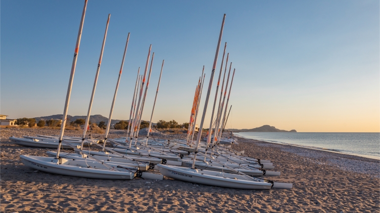 Dinghies on the beach at Levante Beach Club