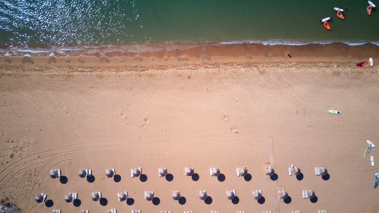 Aerial view of Analipsi beach at Buca Beach Club