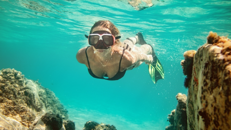 Snorkelling in the crystal clear waters at Neilson | Cook's Club Adakoy