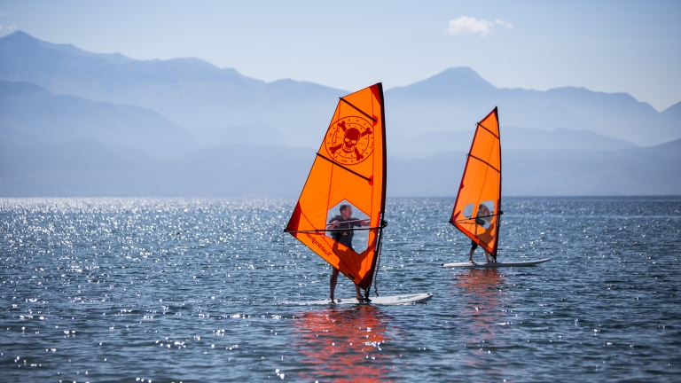 Beginner windsurfers at Buca Beach Club