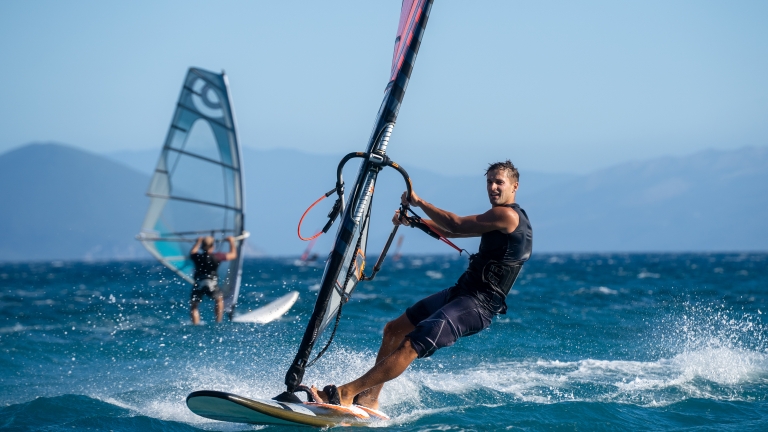 Windsurfing at Cosmos Beach Club