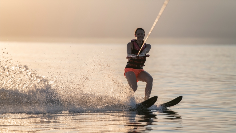 Water skiing at Buca Beach Club