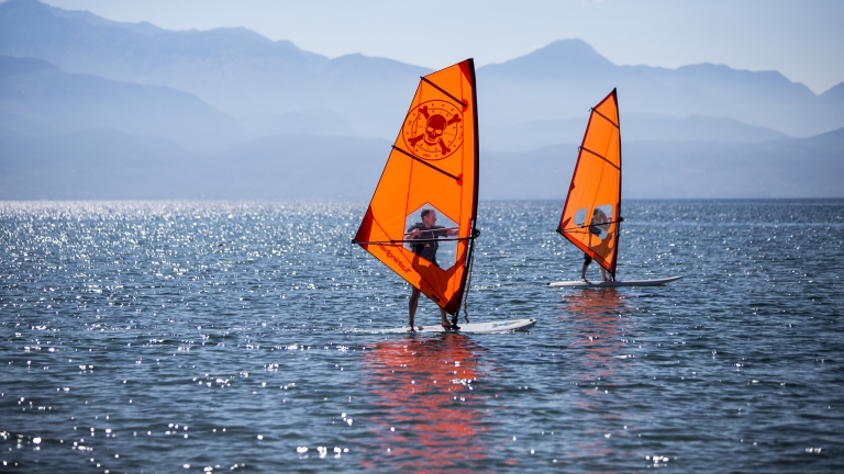 Beginner windsurfers at Buca Beach Club