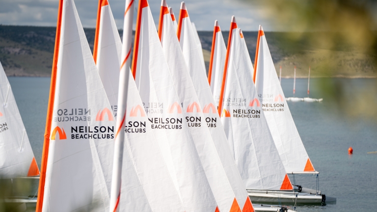 Dinghies lined up at Alana Beach Club