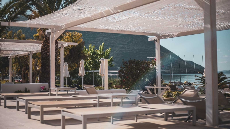 Beachfront terrace at Cosmos Beach Club