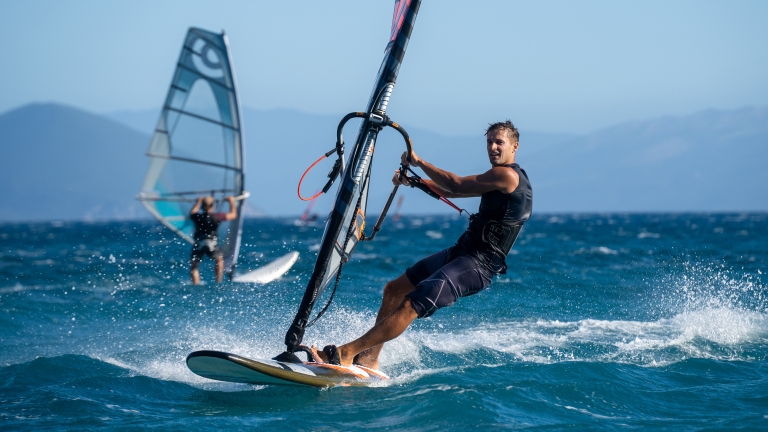 Windsurfing at Cosmos Beach Club