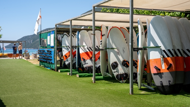 Windsurf boards at Cosmos Beach Club