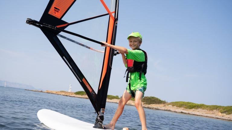 Kids' windsurfing in Sardinia