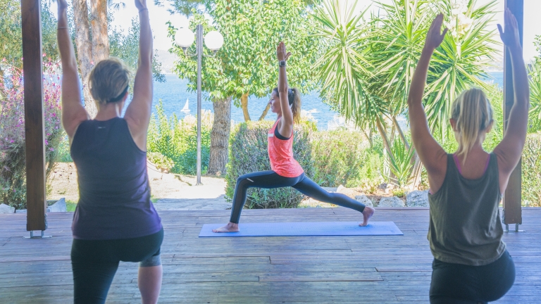 Early morning yoga at Vounaki Beach Club