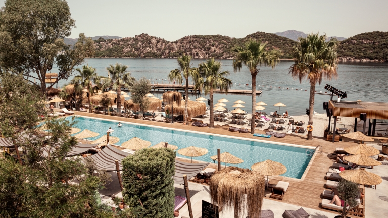 Swimming pool and beach front at Neilson | Cook's Club Adakoy