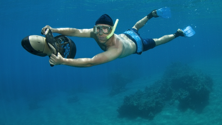 Explore vibrant marine life with sea scooters at Neilson | Cook's Club Adakoy