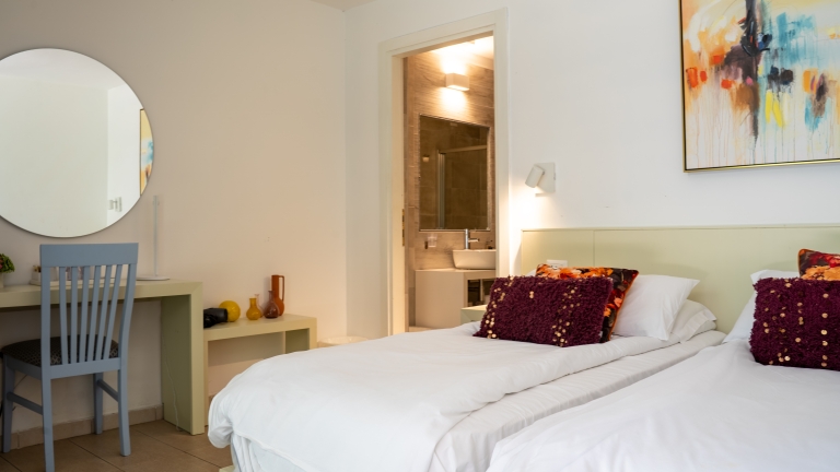 Twin room interior at Baia dei Mori Beach Club