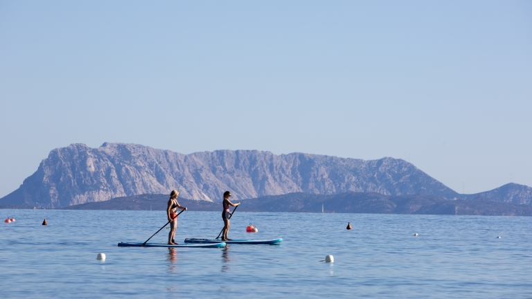 Morning paddle boarding at Baia dei Mori Beach Club