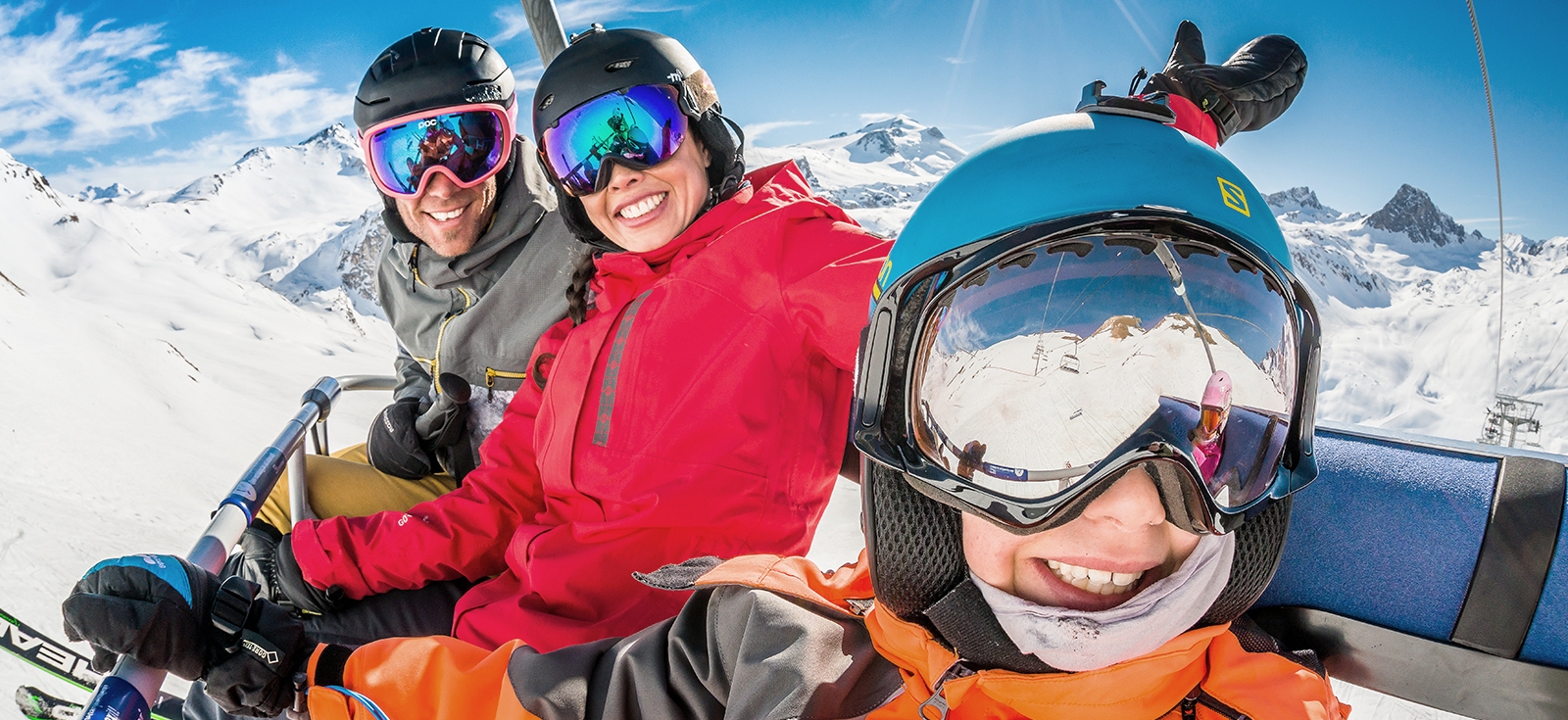 PEOPLE ON A CHAIR LIFT