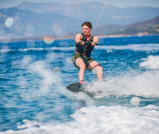 teenager wakeboarding