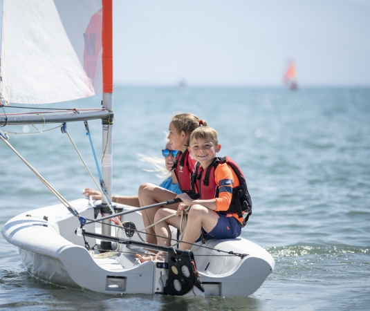 kids on dinghy
