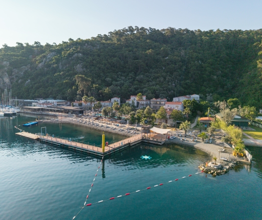 An aerial view of the waterfront at Cooks Club Adakoy
