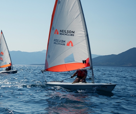 Dinghy sailing Cosmos